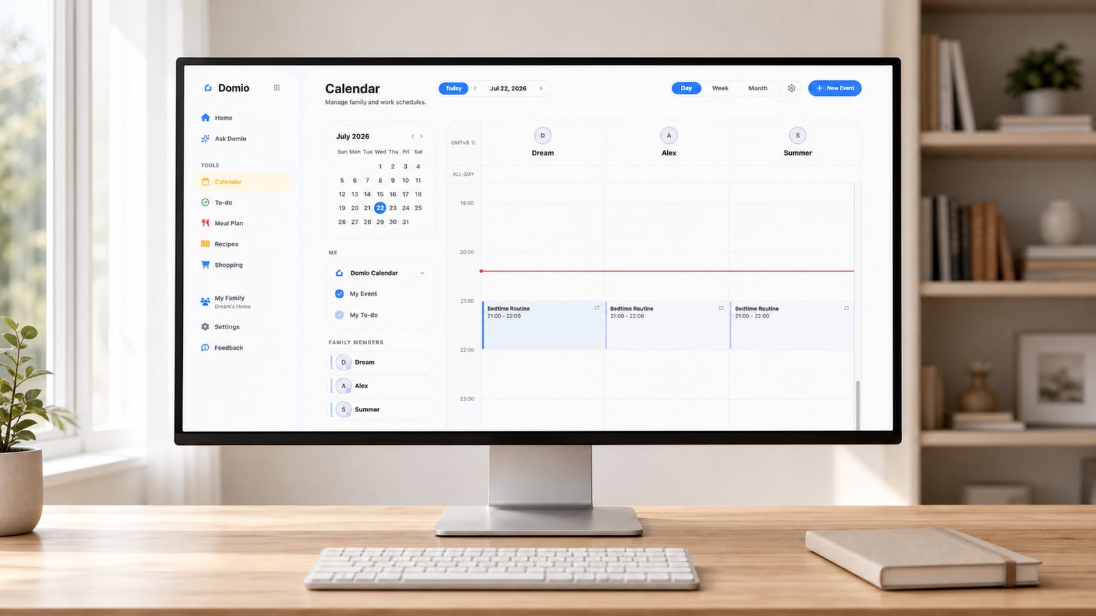 Domio Web day calendar on a home-office desktop monitor
